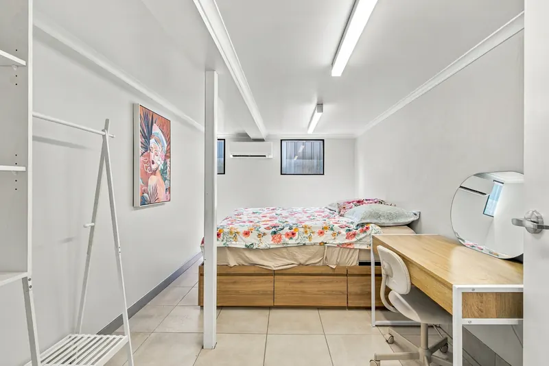 Granny flat bedroom with bed and desk